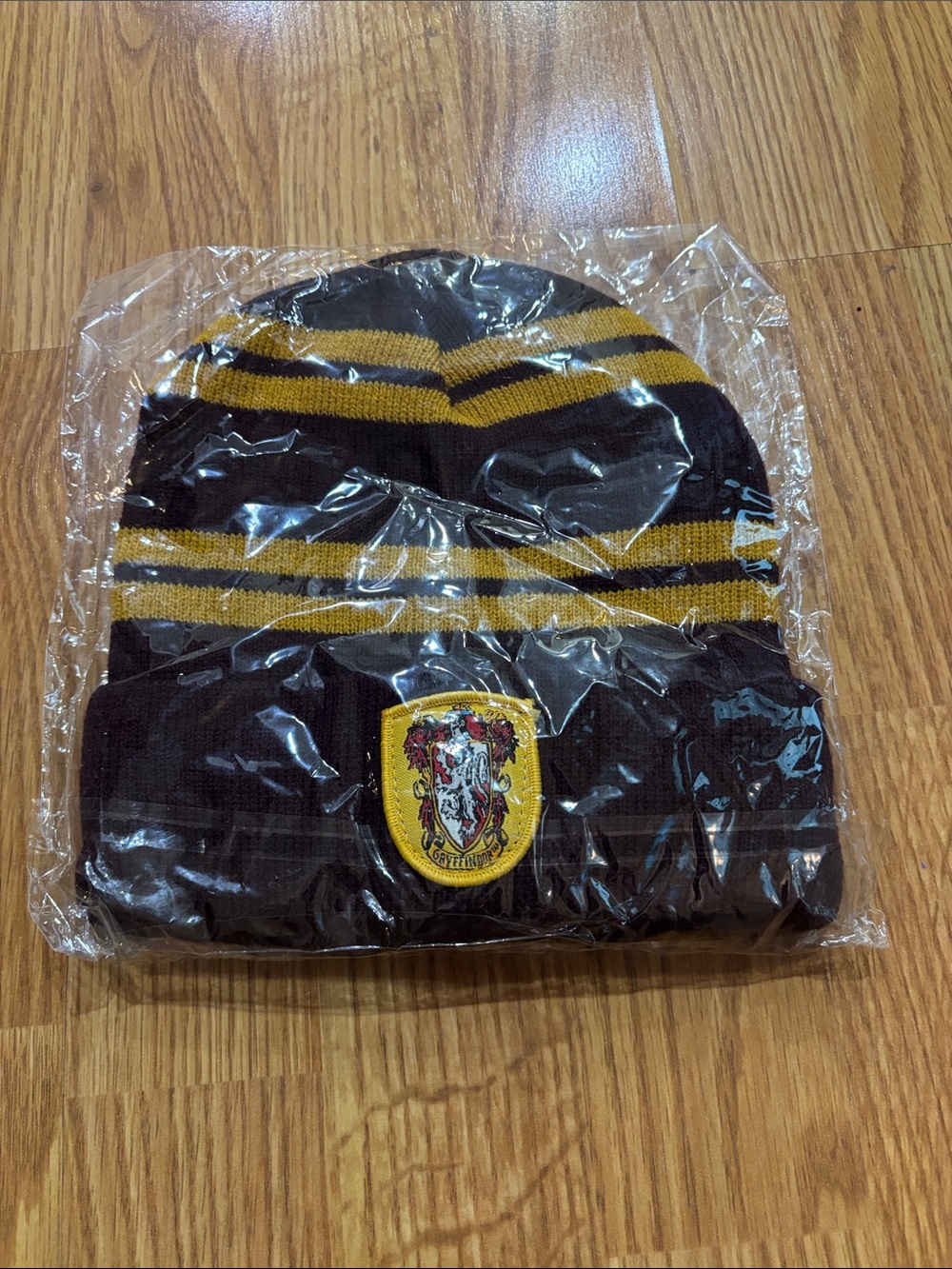 NWT Harry Potter Gryffindor Striped Beanie Knit Hat Maroon Gold